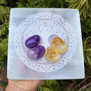 Amethyst and Citrine crystals charged on a selenite plate